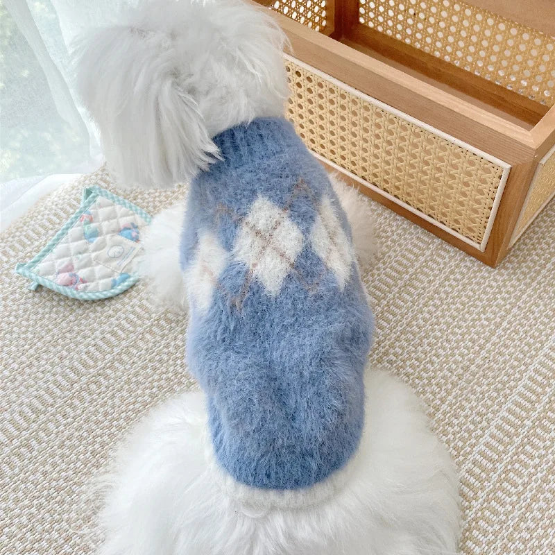 Soft, cozy dog sweater in a light color, featuring a snug fit and stretch for added warmth and comfort.