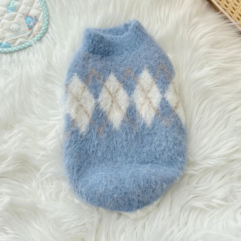 Soft, cozy dog sweater in a light color, featuring a snug fit and stretch for added warmth and comfort.
