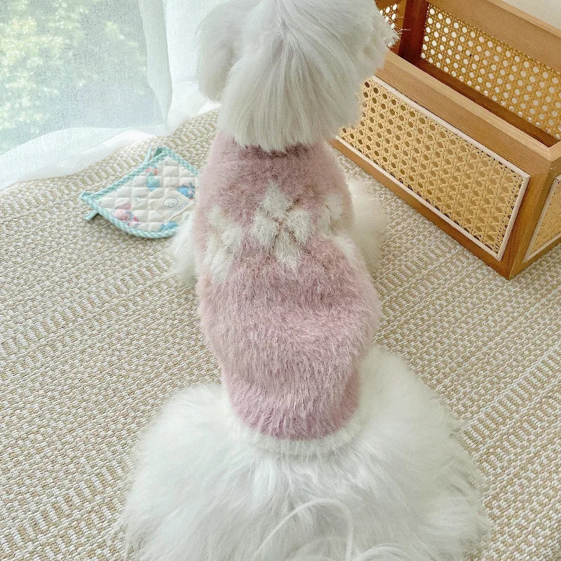 Soft, cozy dog sweater in a light color, featuring a snug fit and stretch for added warmth and comfort.