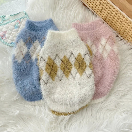 Soft, cozy dog sweater in a light color, featuring a snug fit and stretch for added warmth and comfort.