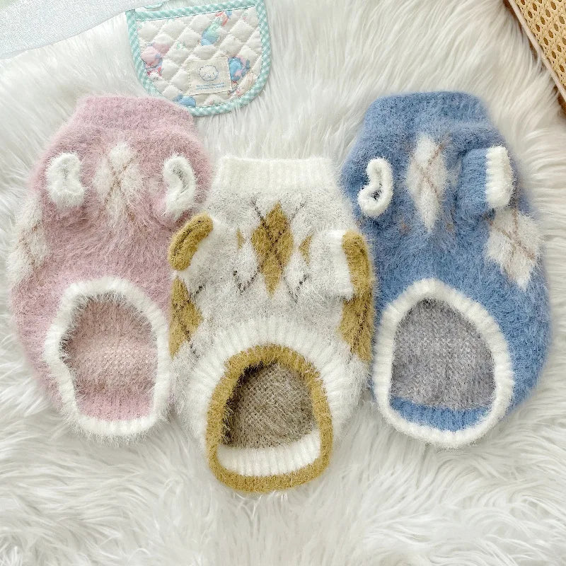 Soft, cozy dog sweater in a light color, featuring a snug fit and stretch for added warmth and comfort.