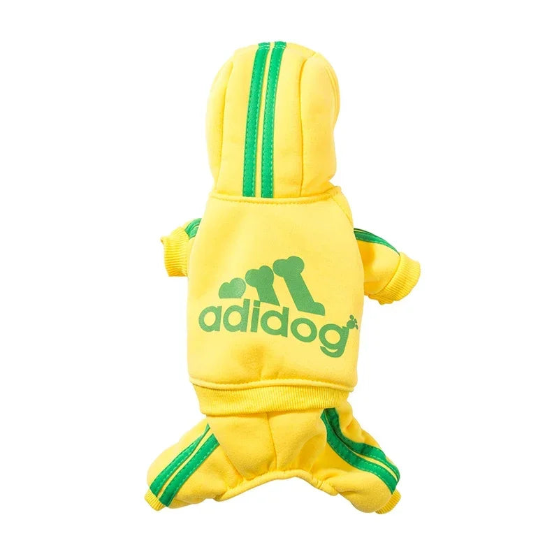Yellow and green dog romper jumpsuit with a sporty pattern, featuring a comfortable fit and stretch for easy dressing.